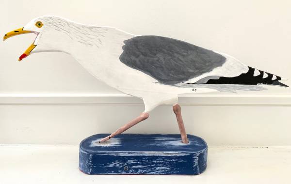 - a , wood Sculpture by John Comley, measuring 30 x 54 cm (H x W) £250